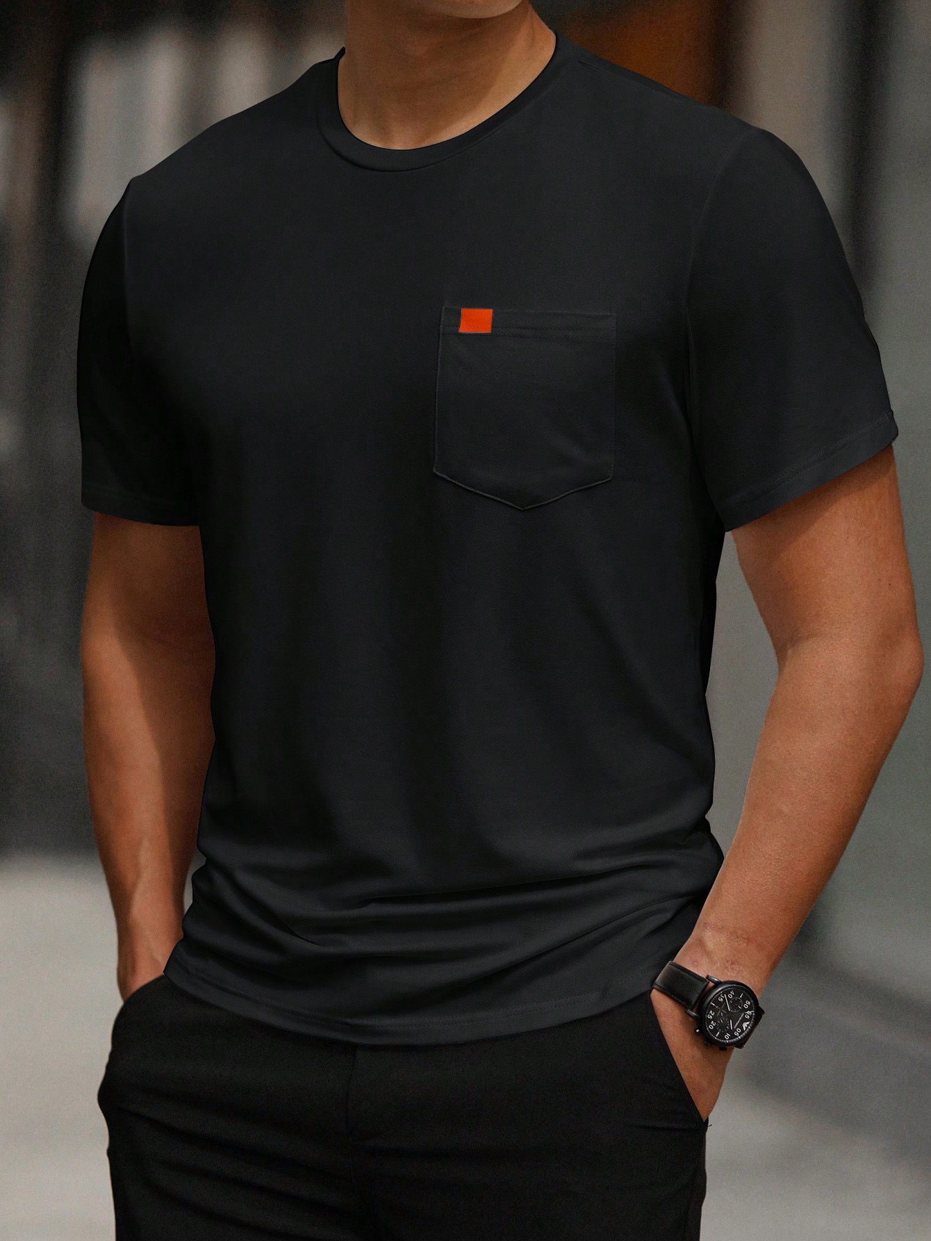 Camiseta unicolor con bolsillo