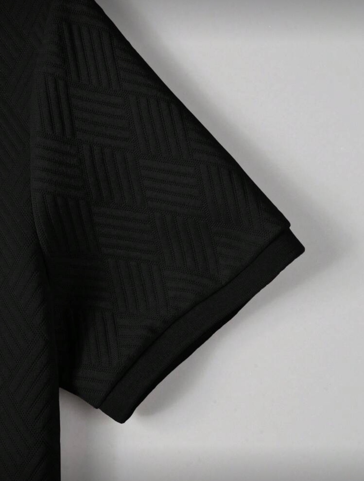 L - Polo texturizada